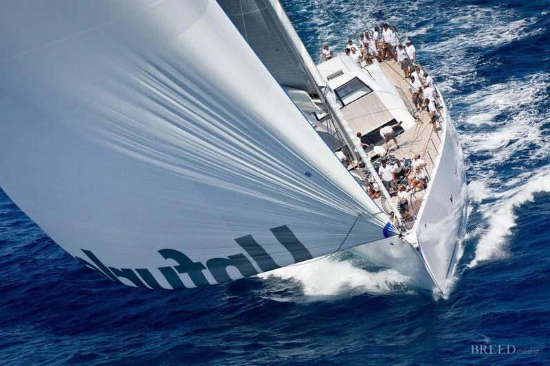 a boat with people on it aboard UNFURLED Yacht for Sale