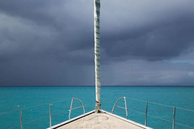 a tall metal tower on a pier aboard UNFURLED Yacht for Sale