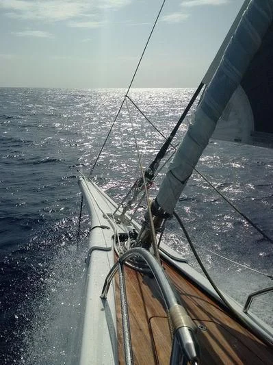 a boat on the water aboard UNFURLED Yacht for Sale