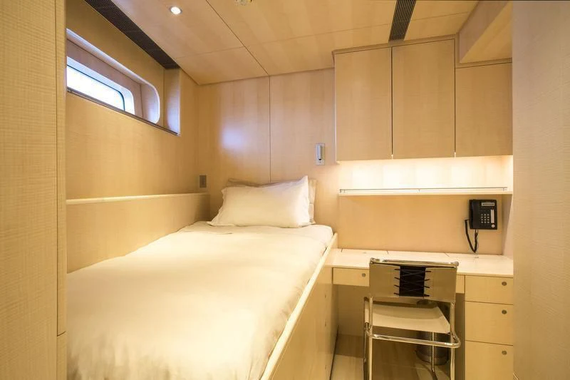 a bed in a room aboard UNFURLED Yacht for Sale