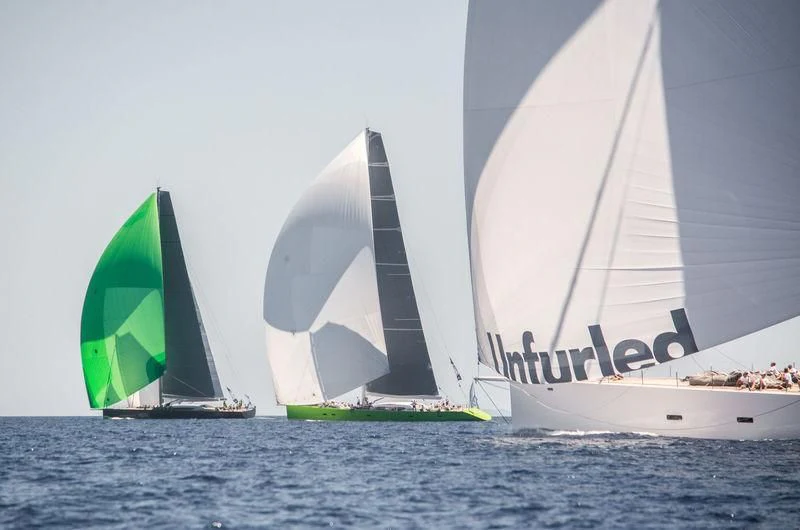 a group of sailboats on the water aboard UNFURLED Yacht for Sale