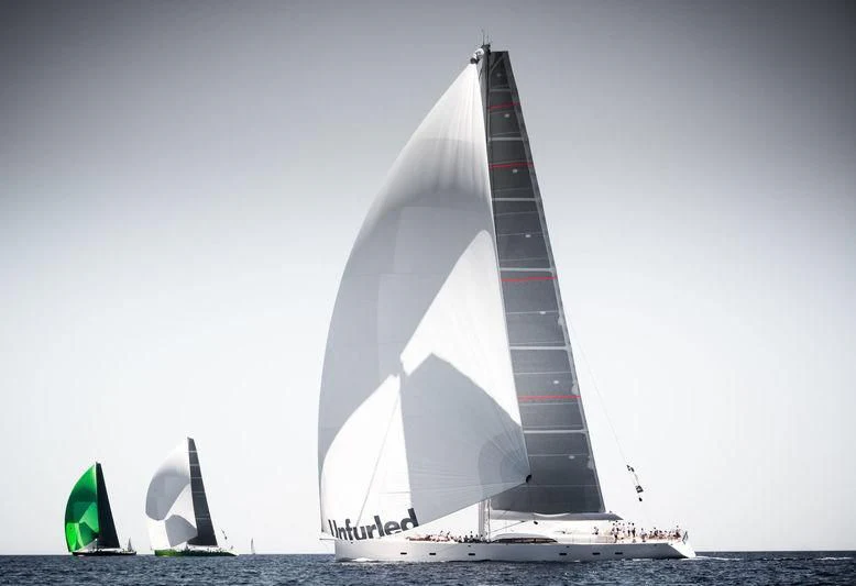 a sailboat in the water aboard UNFURLED Yacht for Sale