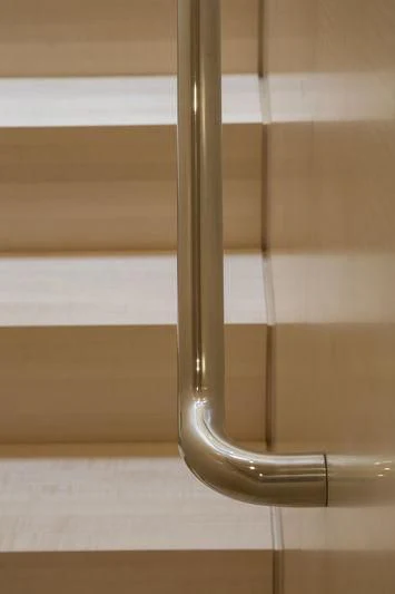 a glass on a table aboard UNFURLED Yacht for Sale