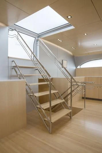 a staircase in a house aboard UNFURLED Yacht for Sale
