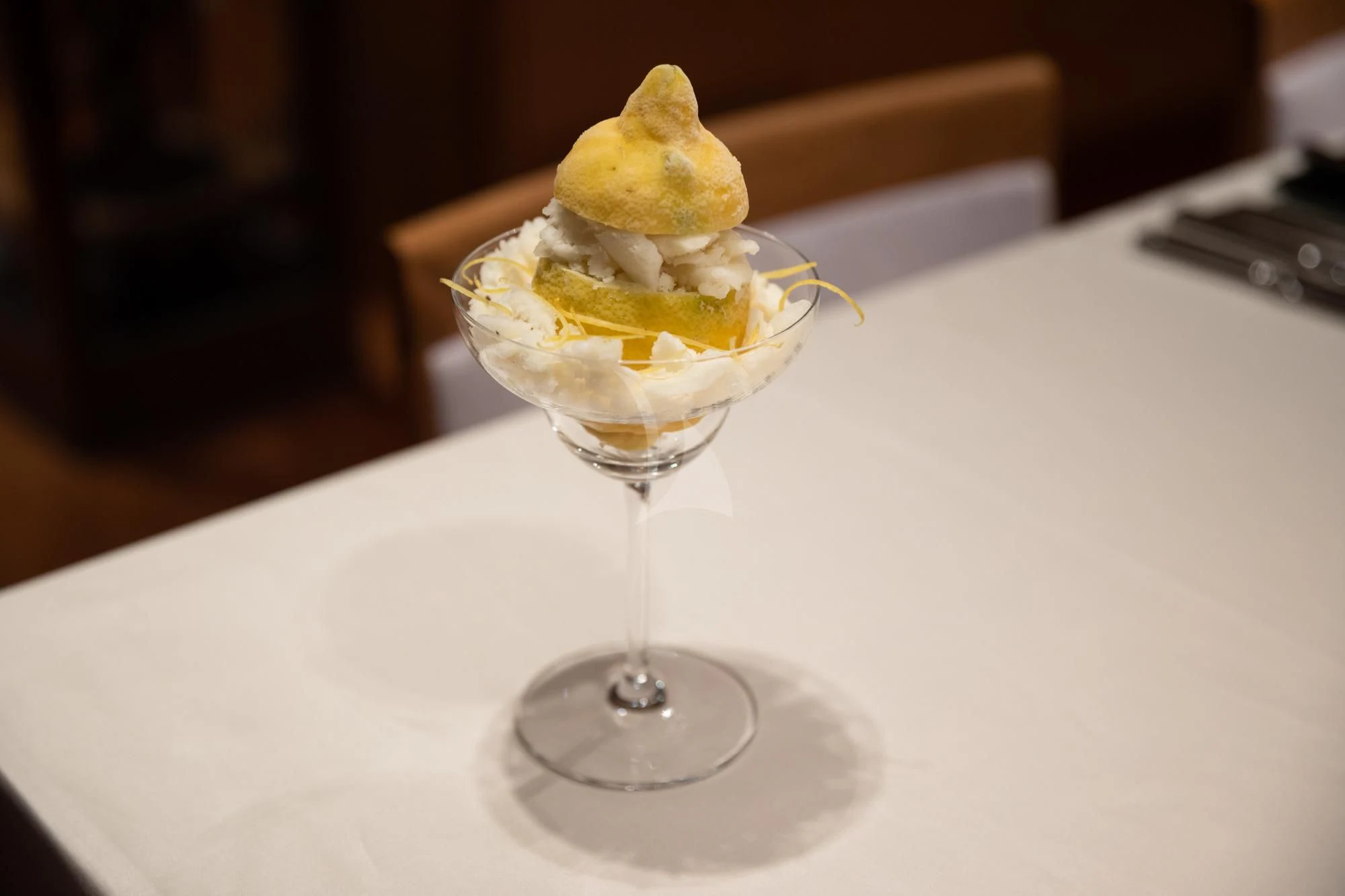 a glass with ice cream and a scoop of ice cream on it aboard FALCO MOSCATA Yacht for Sale