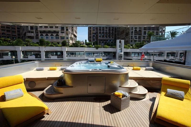 a room with a table and chairs aboard FALCO MOSCATA Yacht for Sale