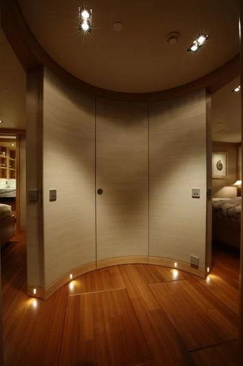 a room with a wood floor and a large mirror aboard FALCO MOSCATA Yacht for Sale