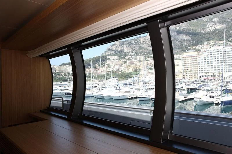 a room with a large window aboard FALCO MOSCATA Yacht for Sale