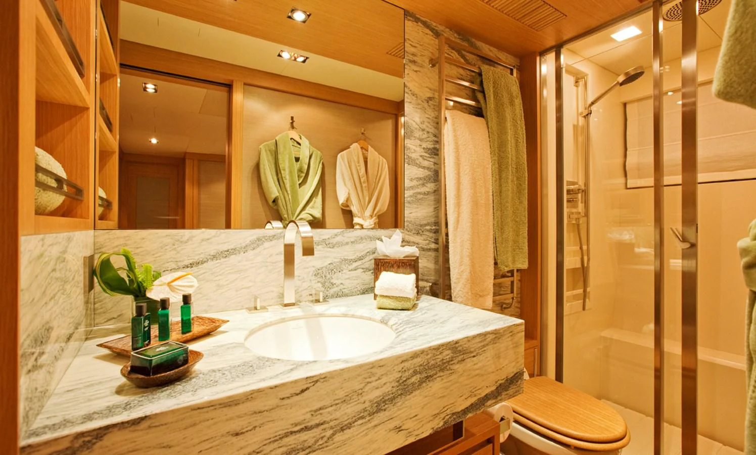 a bathroom with a large mirror aboard FALCO MOSCATA Yacht for Sale
