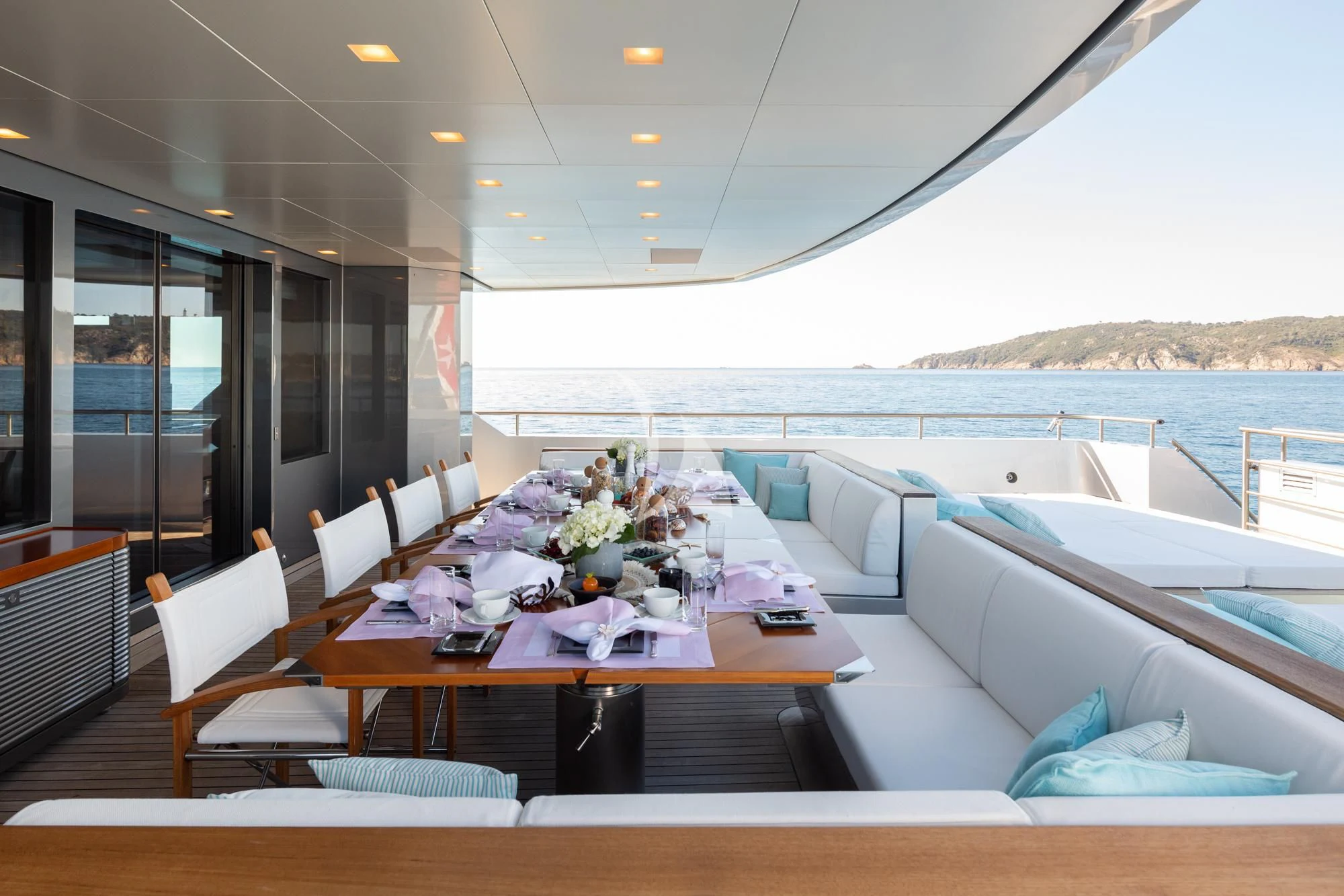 a large dining table on a boat aboard FALCO MOSCATA Yacht for Sale
