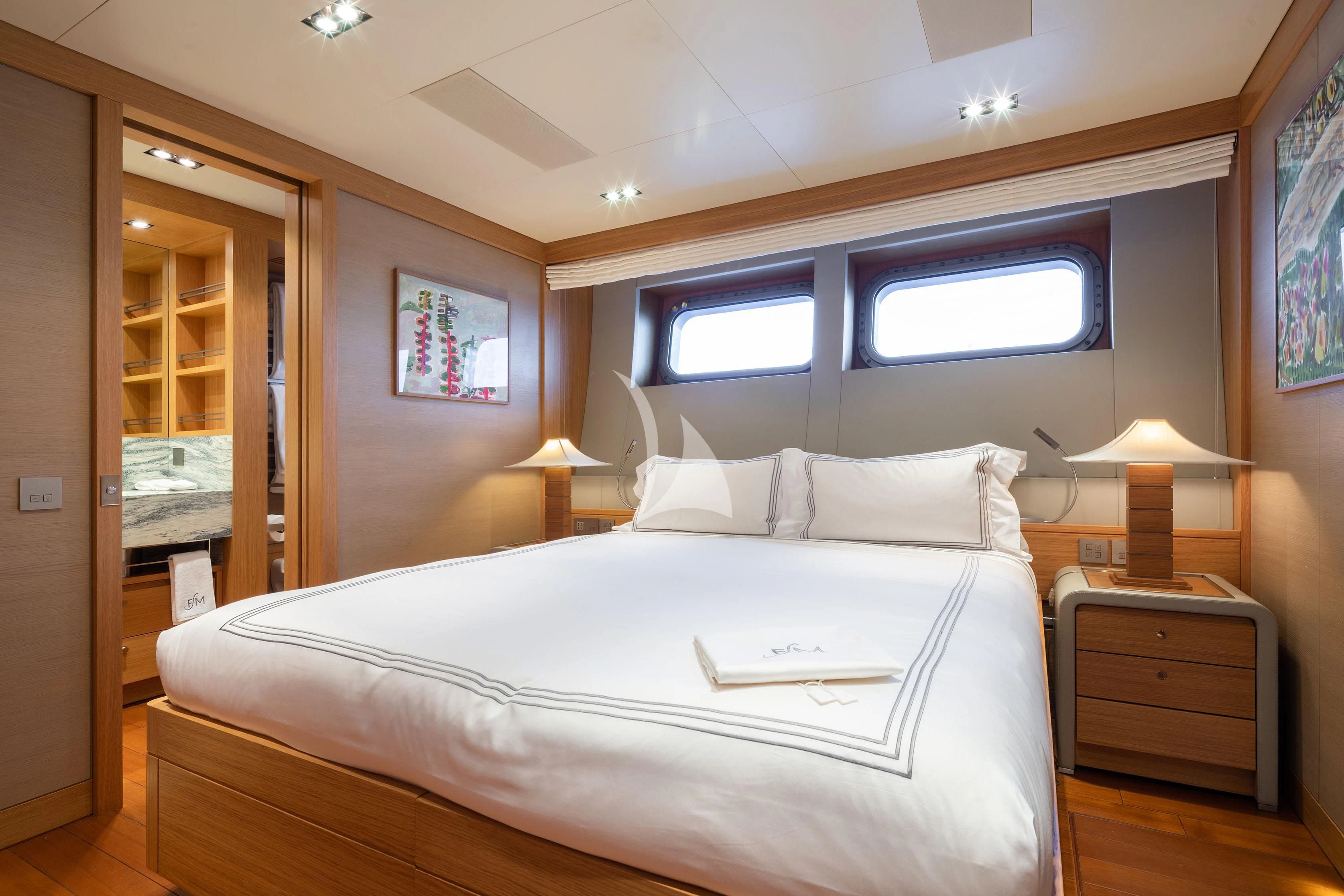 a bed with a white sheet aboard FALCO MOSCATA Yacht for Sale
