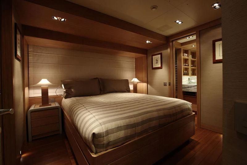 a bed in a room aboard FALCO MOSCATA Yacht for Sale