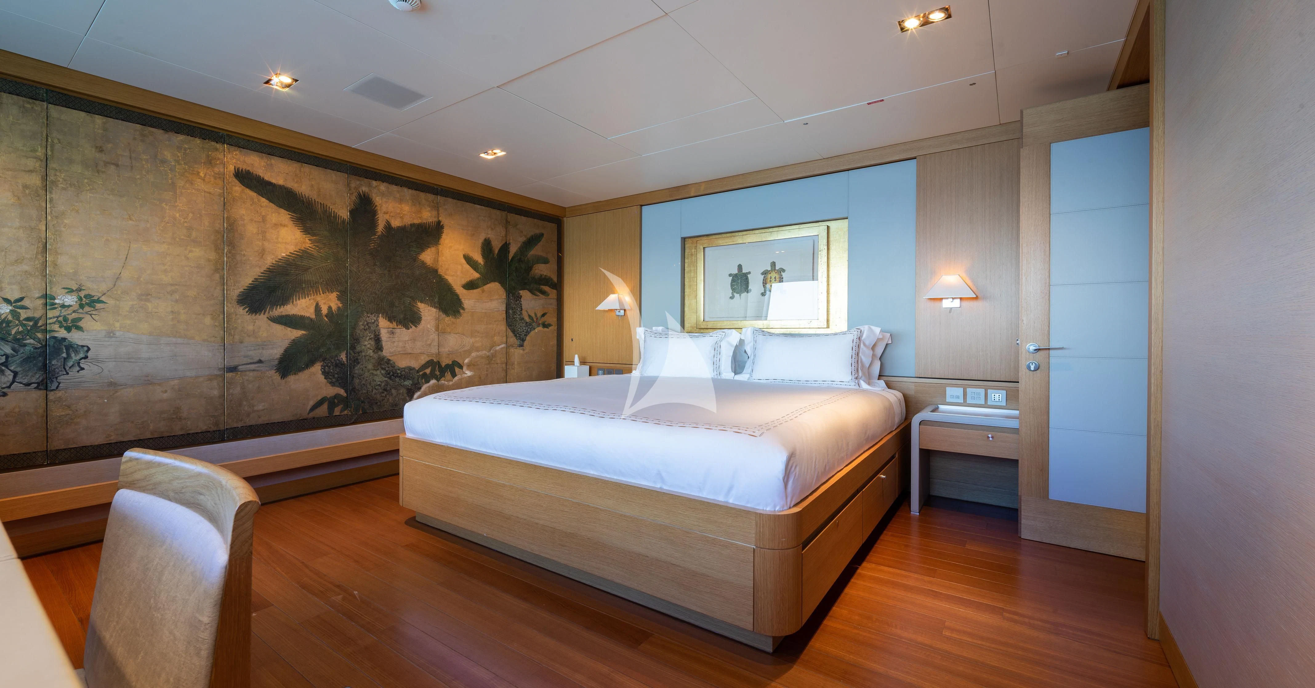 a bedroom with a large painting aboard FALCO MOSCATA Yacht for Sale