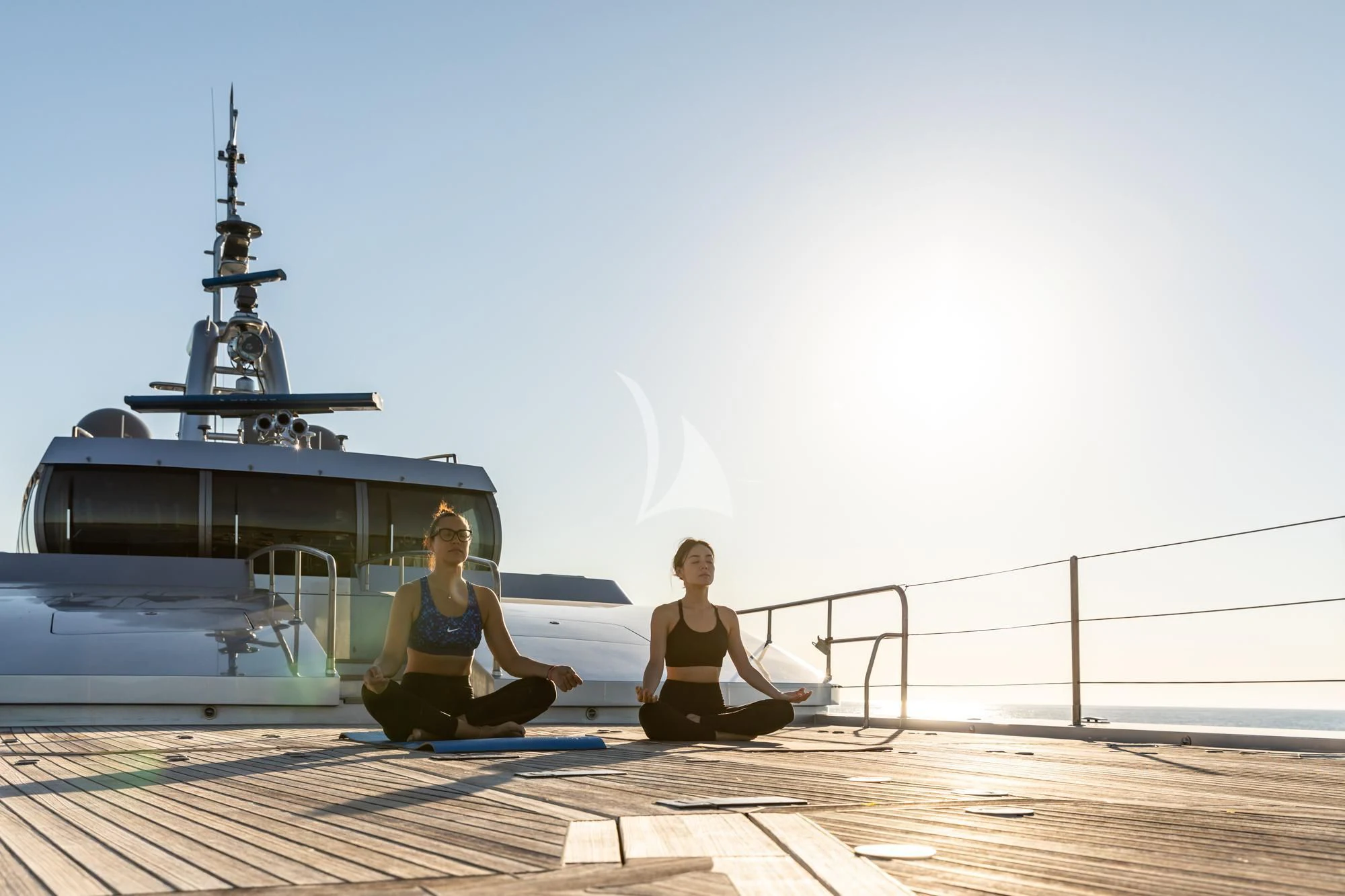 a person sitting on a dock aboard FALCO MOSCATA Yacht for Sale
