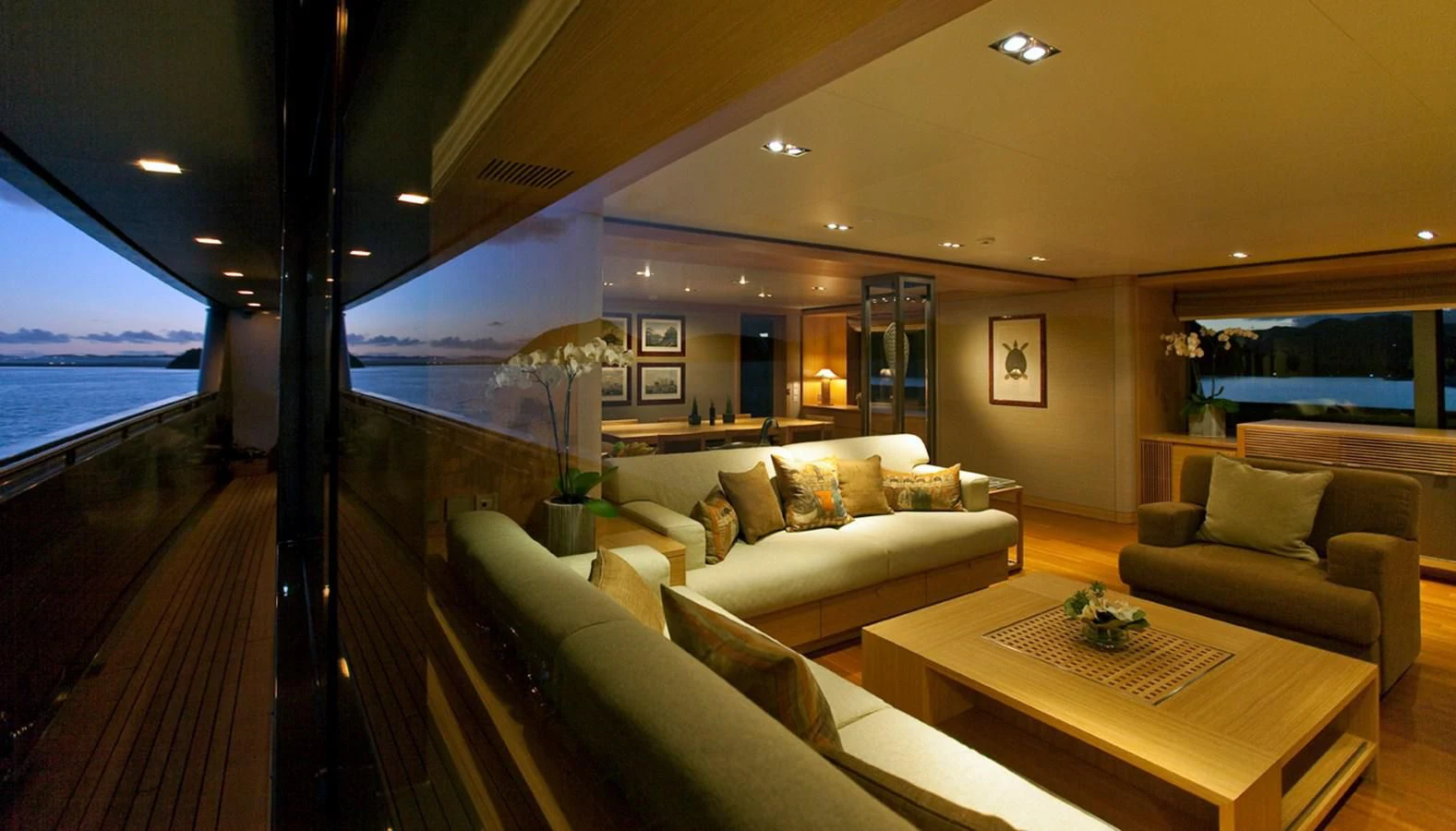 a living room with a wood floor aboard FALCO MOSCATA Yacht for Sale