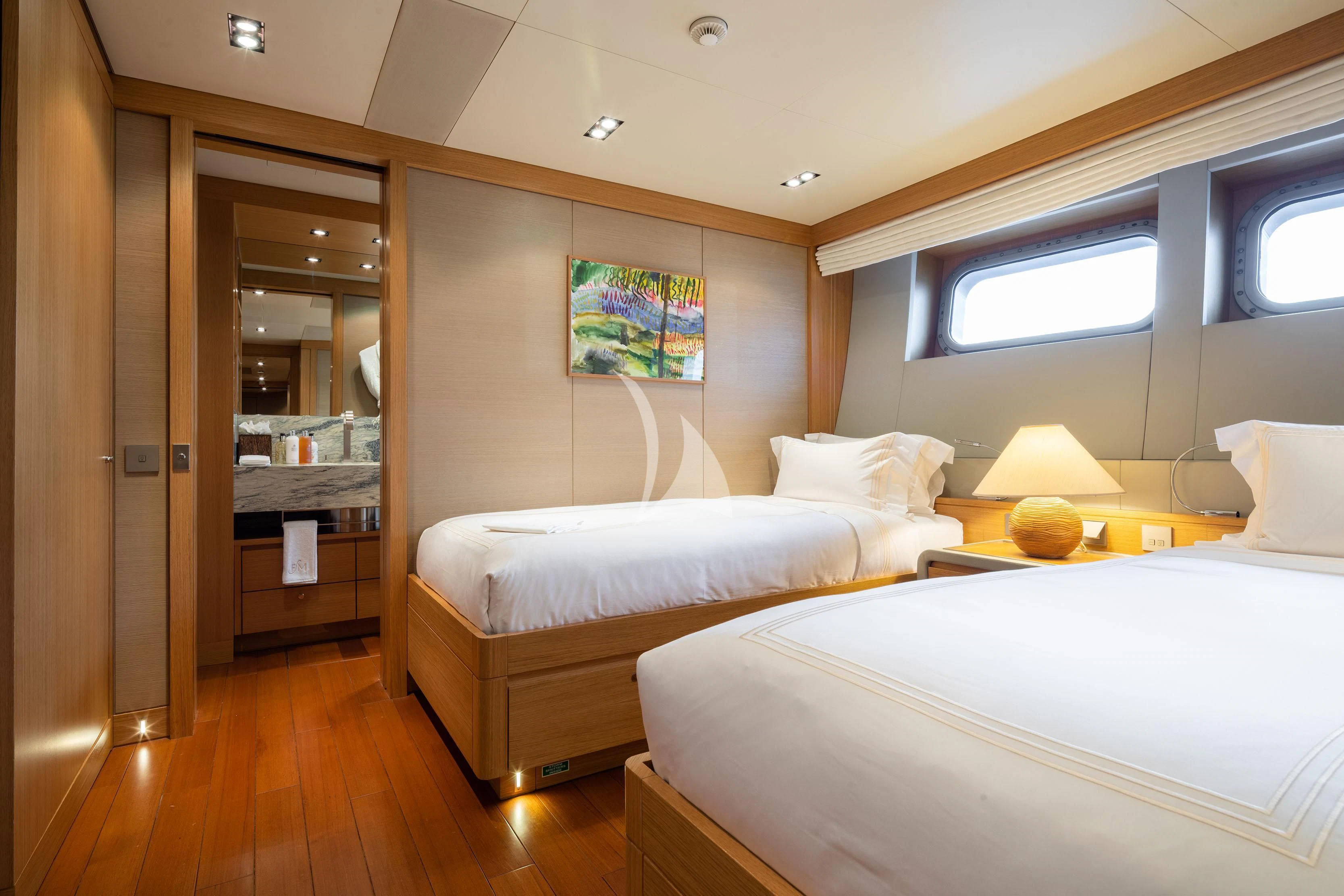 a hotel room with two beds aboard FALCO MOSCATA Yacht for Sale