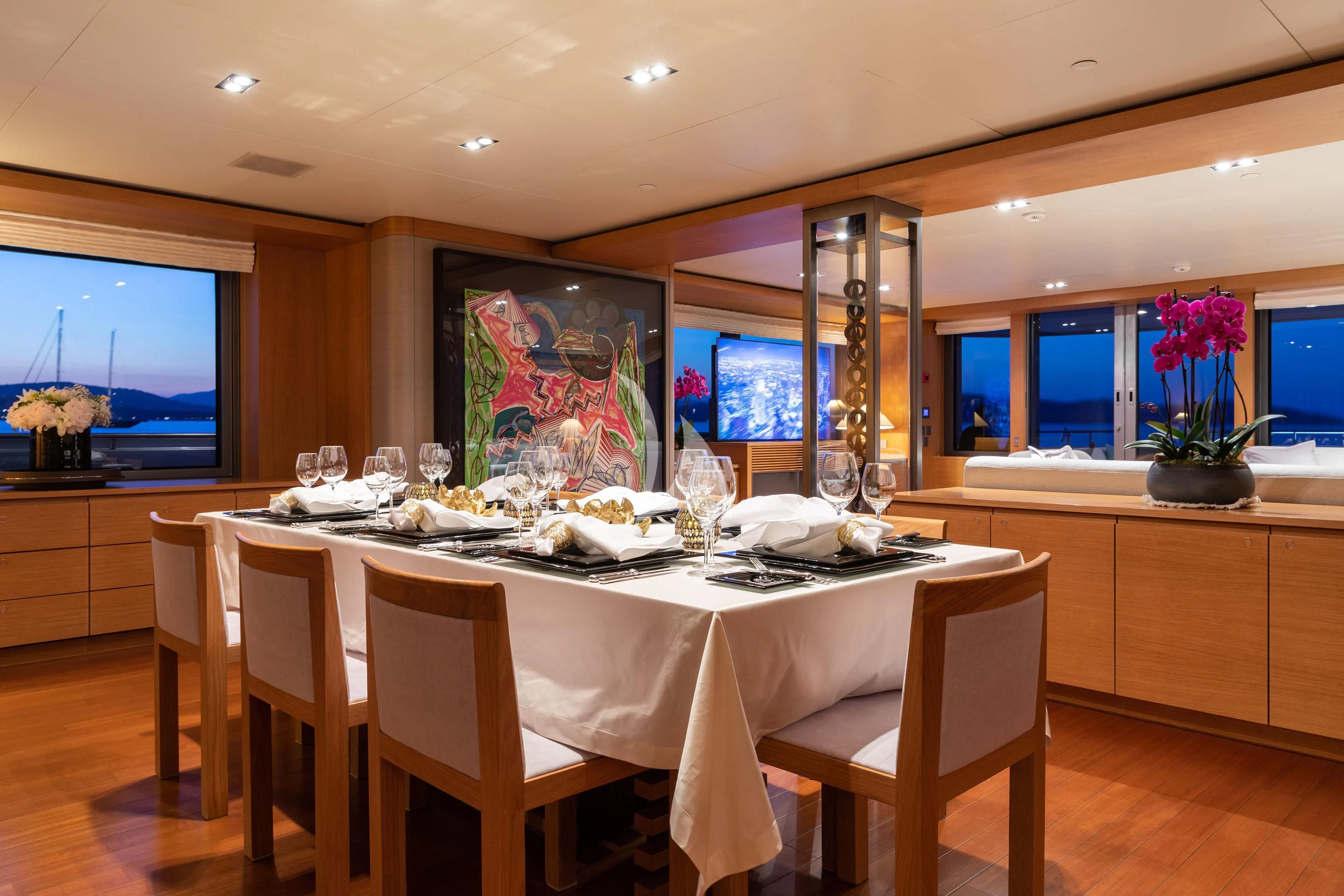 a large kitchen with a large table aboard FALCO MOSCATA Yacht for Sale