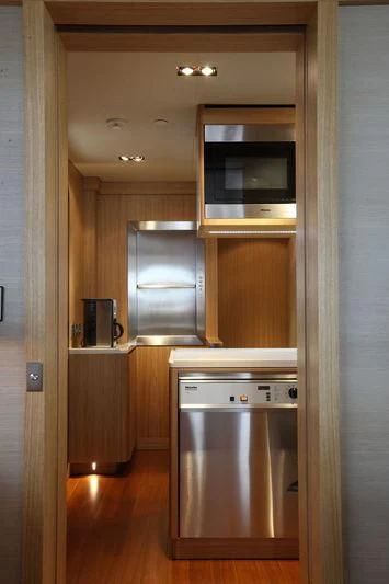 a kitchen with a microwave oven aboard FALCO MOSCATA Yacht for Sale