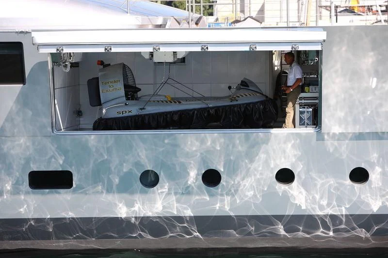 a person standing next to a large machine aboard FALCO MOSCATA Yacht for Sale