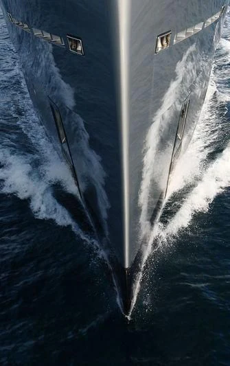 a plane wing and a blue sky aboard FALCO MOSCATA Yacht for Sale