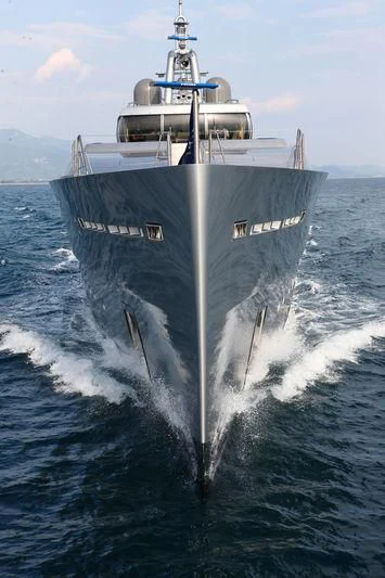 a large navy ship in the water aboard FALCO MOSCATA Yacht for Sale