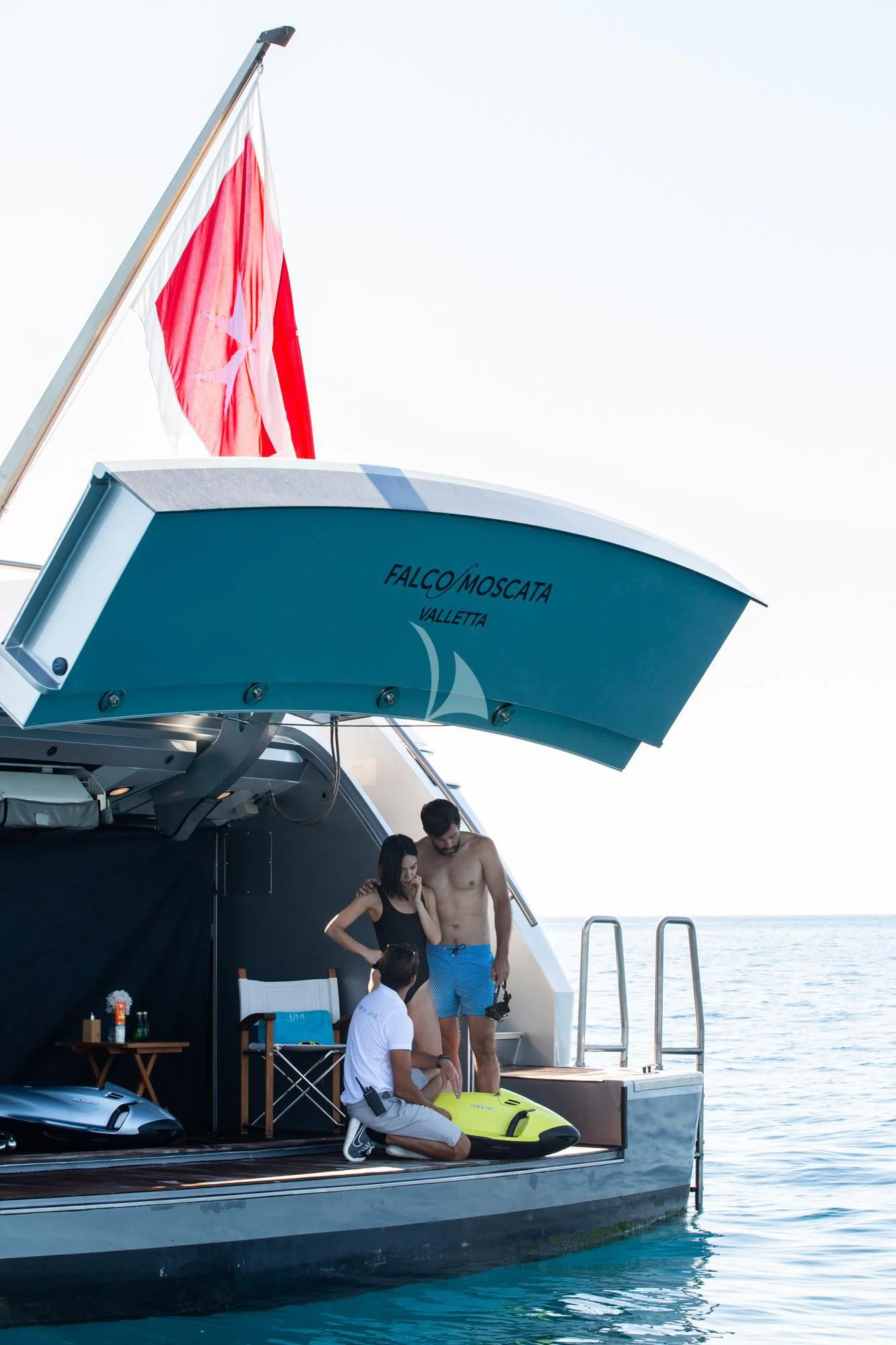 a boat with a flag on it aboard FALCO MOSCATA Yacht for Sale