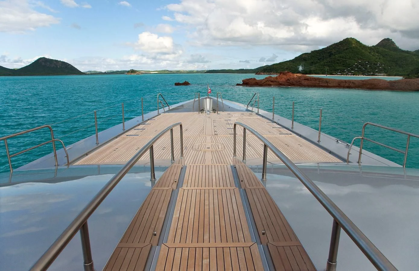 a wooden bridge over water aboard FALCO MOSCATA Yacht for Sale