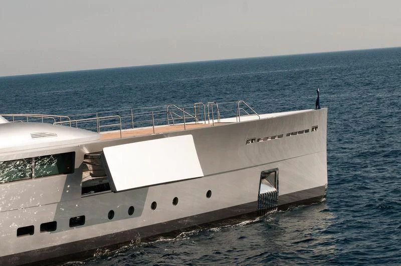 a white boat on the beach aboard FALCO MOSCATA Yacht for Sale