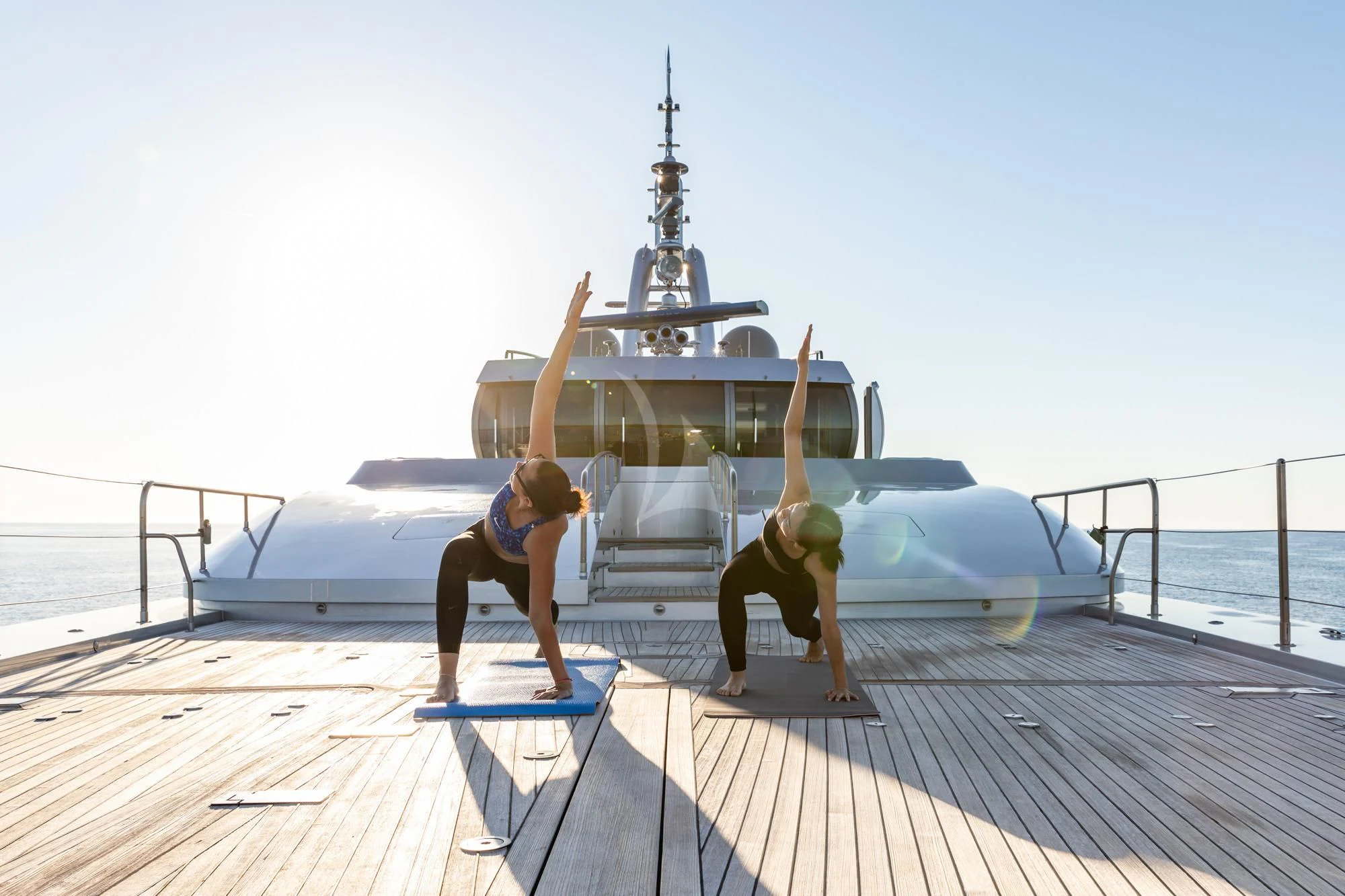 a couple of people on a dock aboard FALCO MOSCATA Yacht for Sale