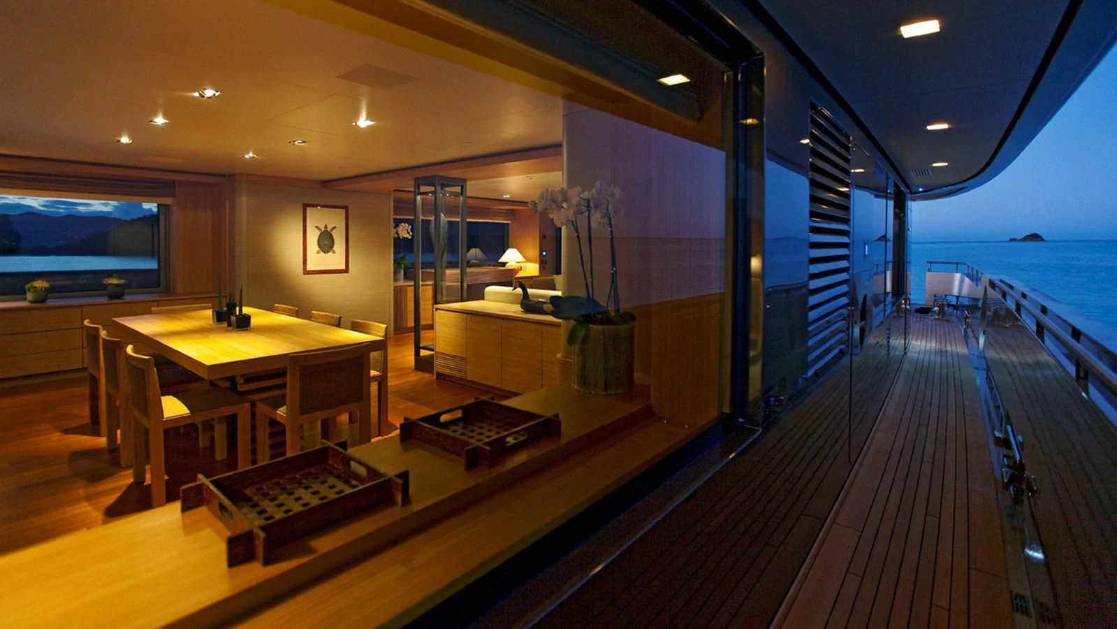 a room with a table and chairs aboard FALCO MOSCATA Yacht for Sale