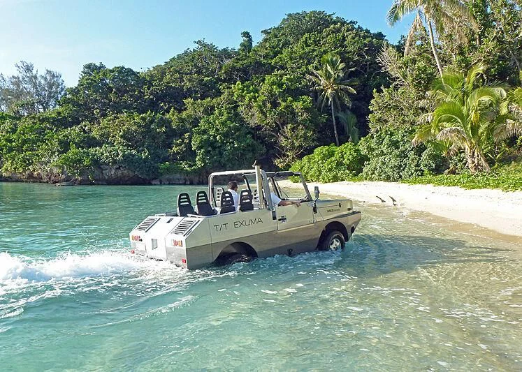 a car driving on a beach aboard FALCO MOSCATA Yacht for Sale