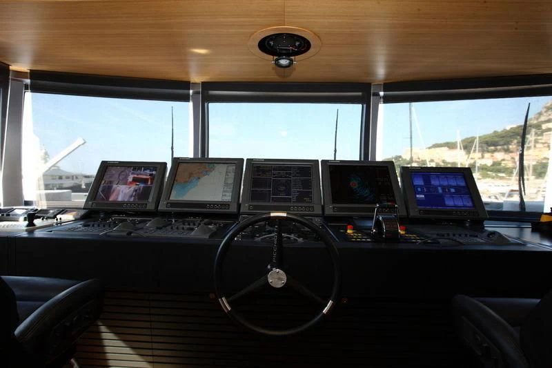 a control room with many monitors aboard FALCO MOSCATA Yacht for Sale