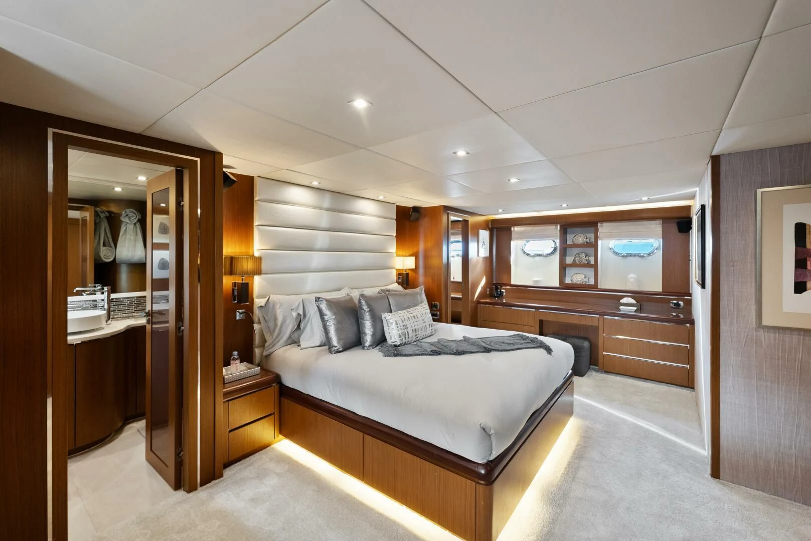 a large bedroom with a large bed aboard PRINCESS LONA Yacht for Sale
