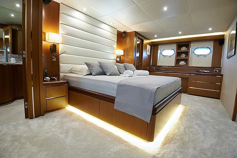 a bed in a room aboard PRINCESS LONA Yacht for Sale
