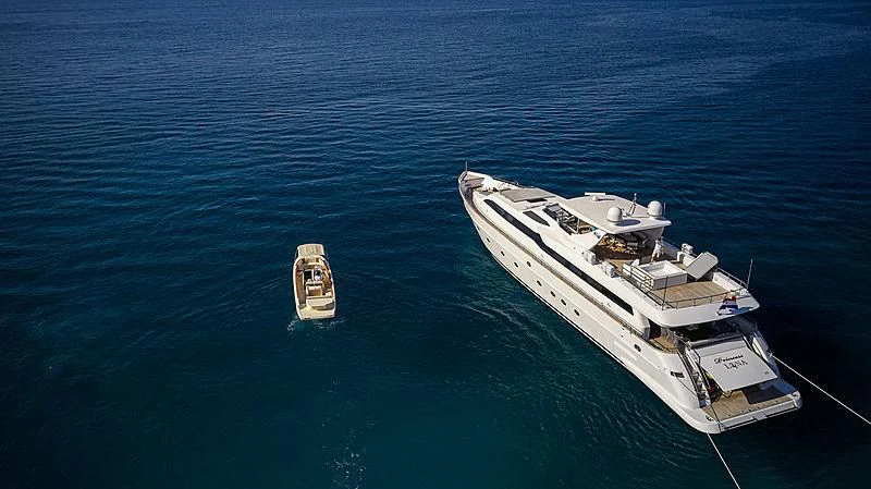 a couple of boats in the water aboard PRINCESS LONA Yacht for Sale