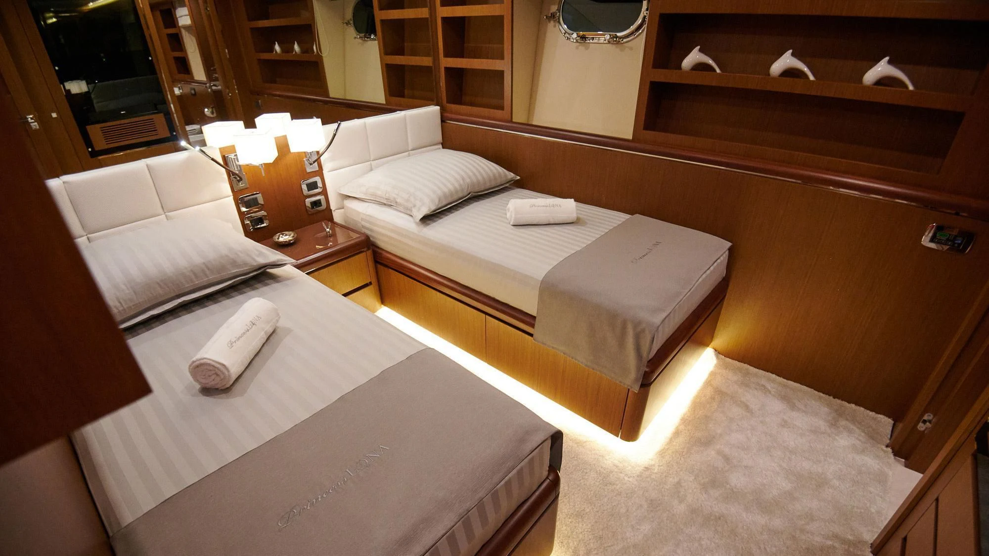 a hotel room with beds aboard PRINCESS LONA Yacht for Sale