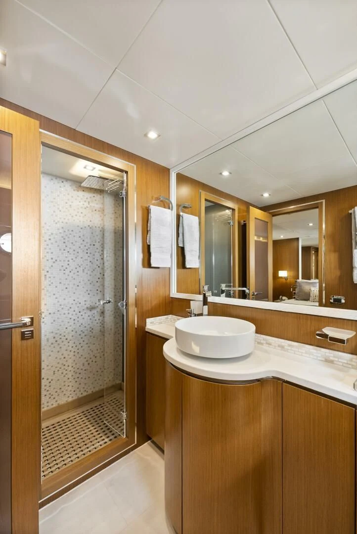 a bathroom with a sink and a shower aboard PRINCESS LONA Yacht for Sale