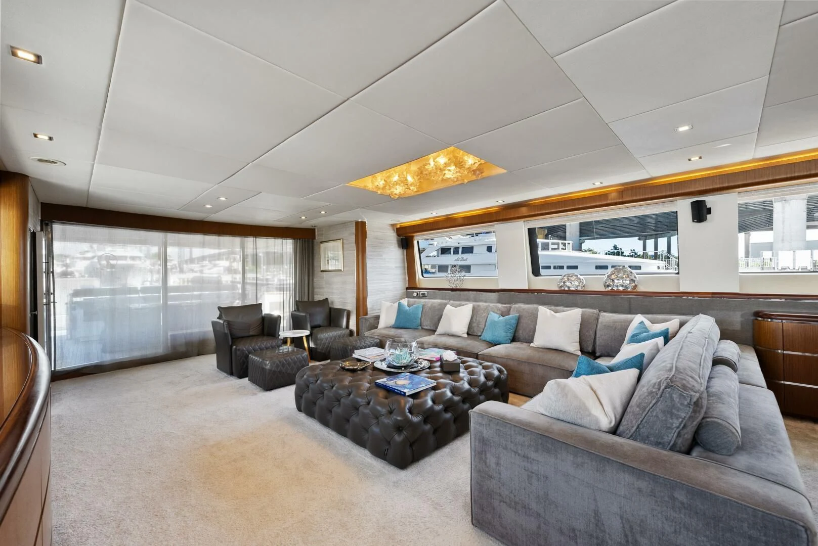 a living room with a large window aboard PRINCESS LONA Yacht for Sale