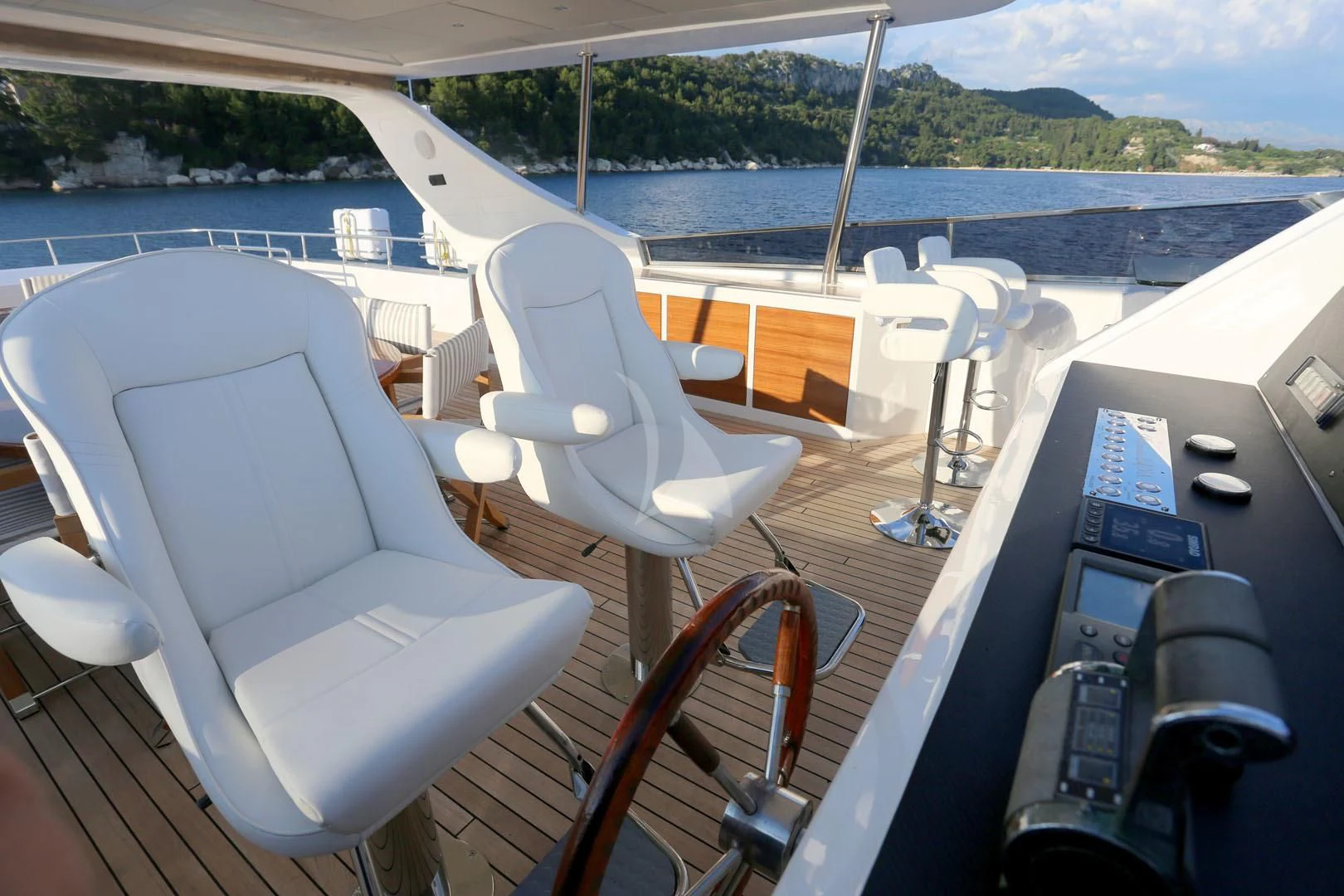 a boat with a desk and chairs on it aboard PRINCESS LONA Yacht for Sale