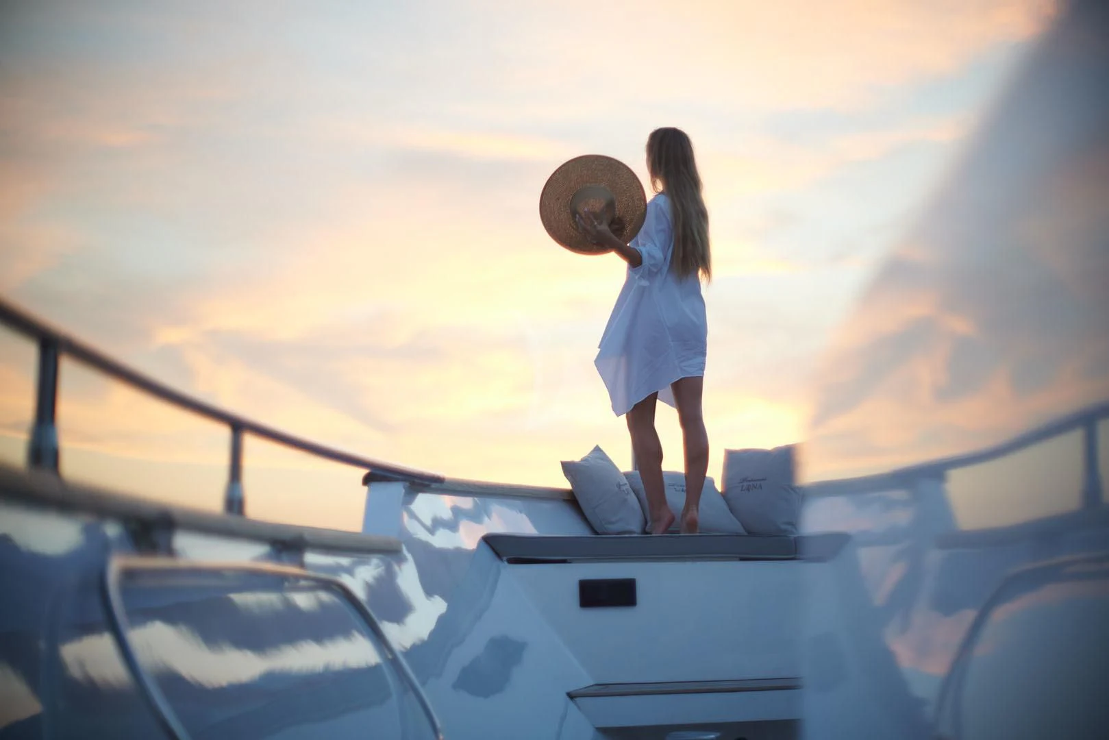 a girl standing on a rooftop aboard PRINCESS LONA Yacht for Sale
