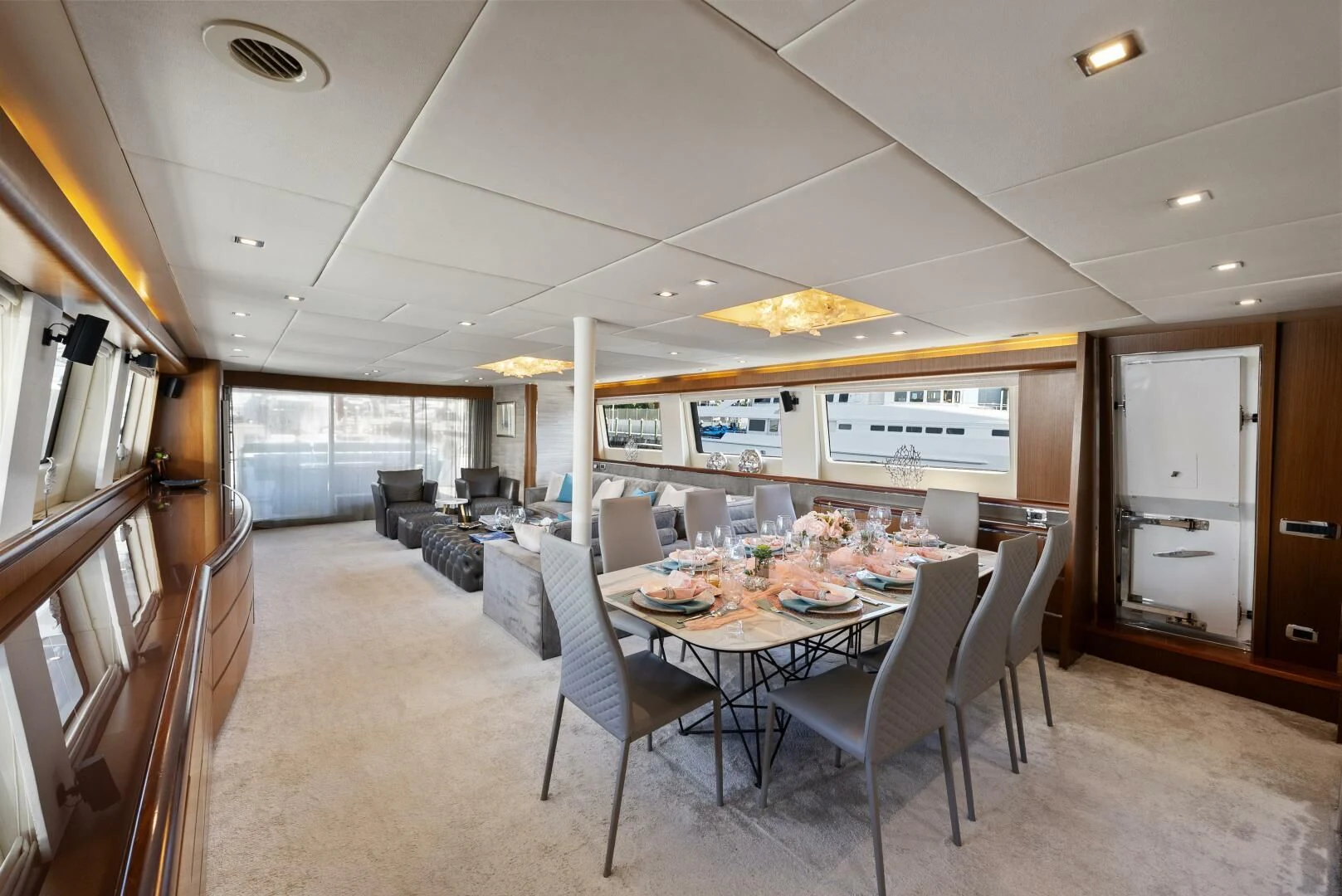 a dining room with a table and chairs aboard PRINCESS LONA Yacht for Sale