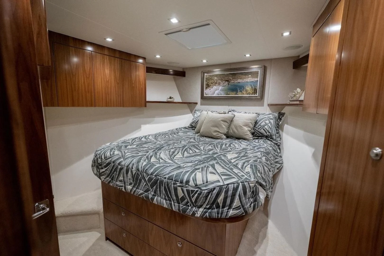 a bed in a room aboard GAME ON Yacht for Sale