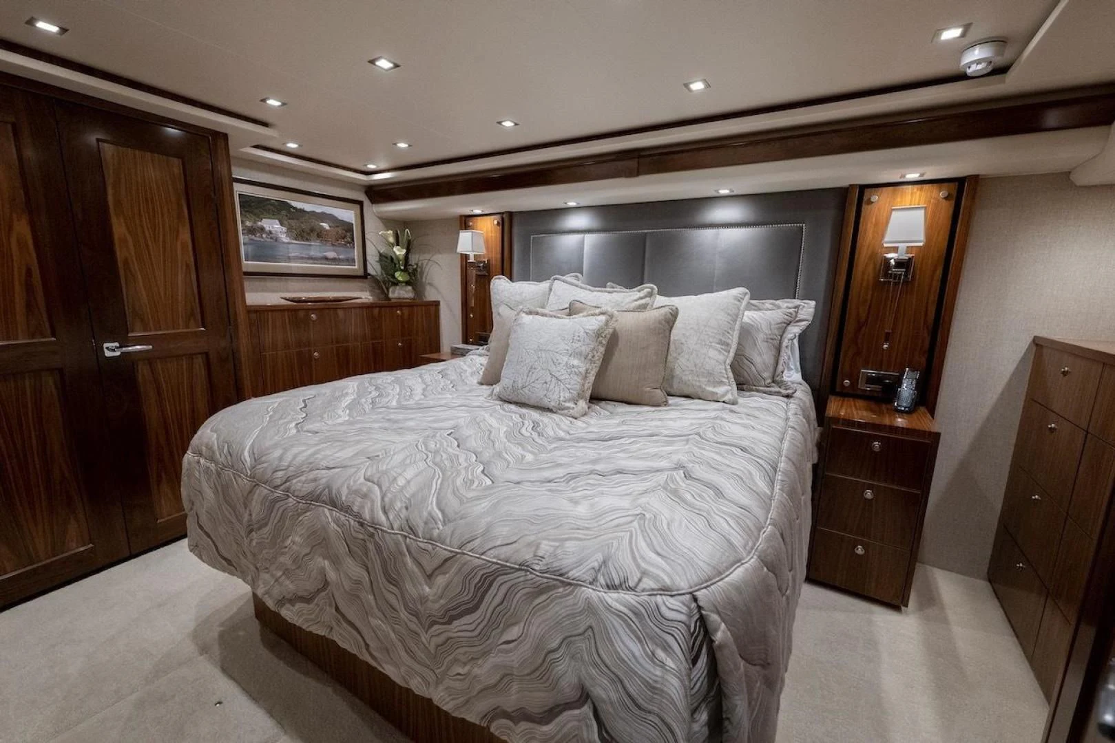 a large bed in a hotel room aboard GAME ON Yacht for Sale