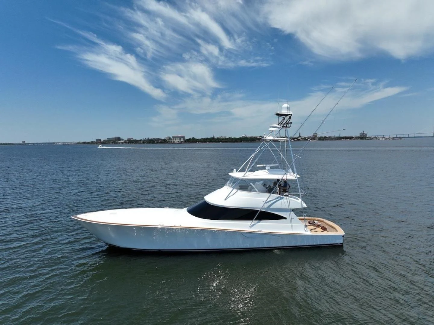 a white boat in the water aboard GAME ON Yacht for Sale