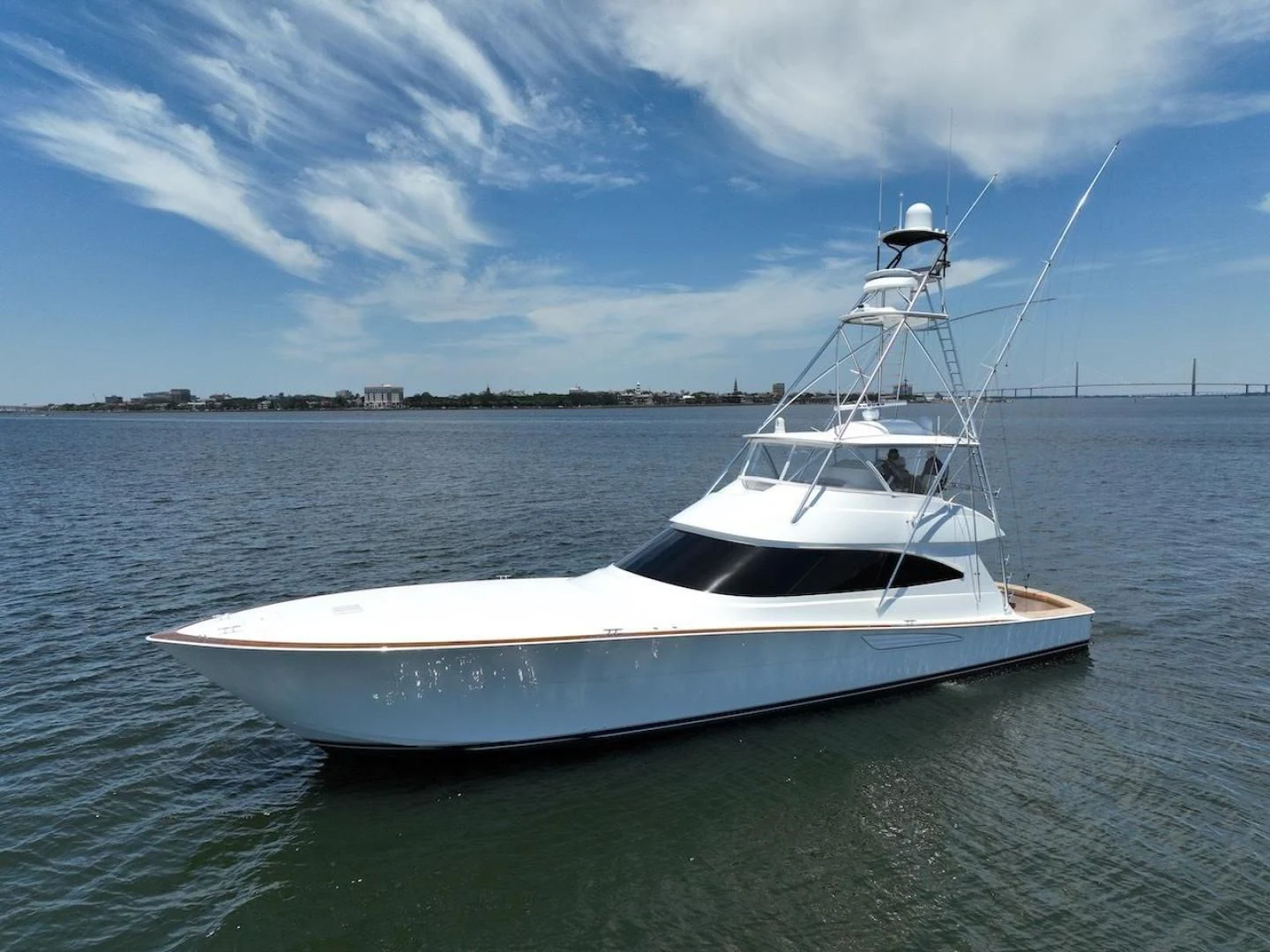 a white boat in the water aboard GAME ON Yacht for Sale