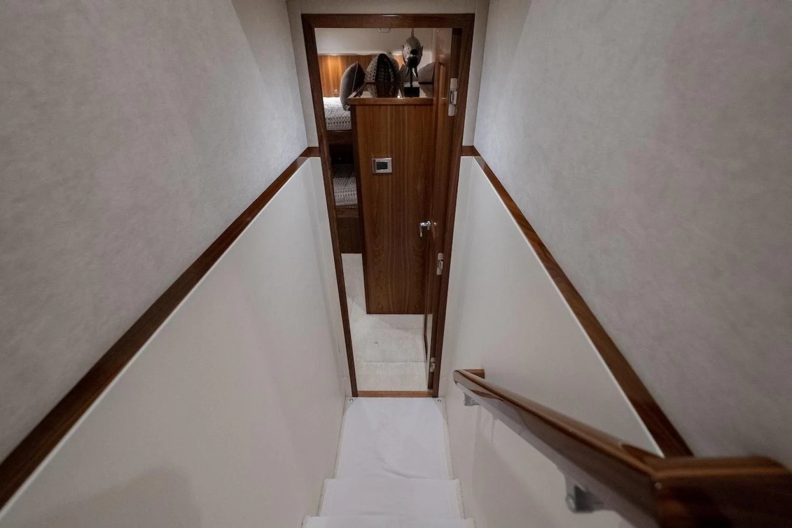 a wooden door leading to a room aboard GAME ON Yacht for Sale