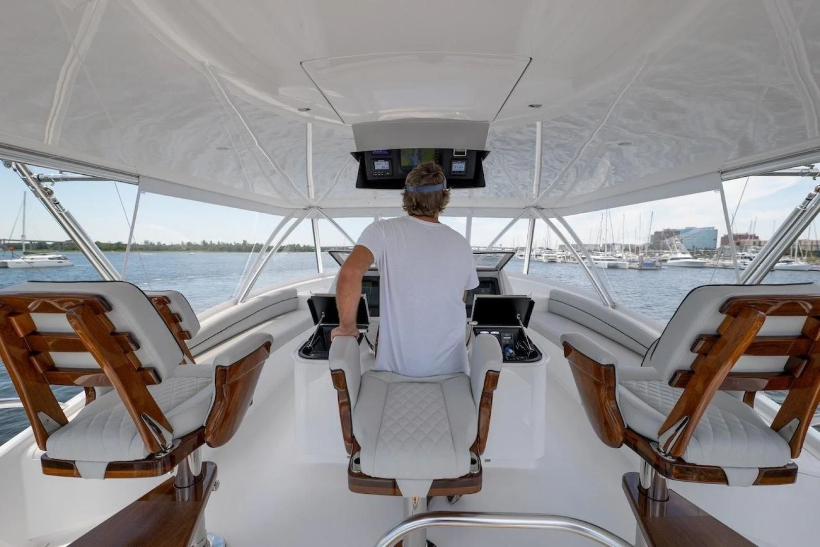 a person sitting in a boat aboard GAME ON Yacht for Sale