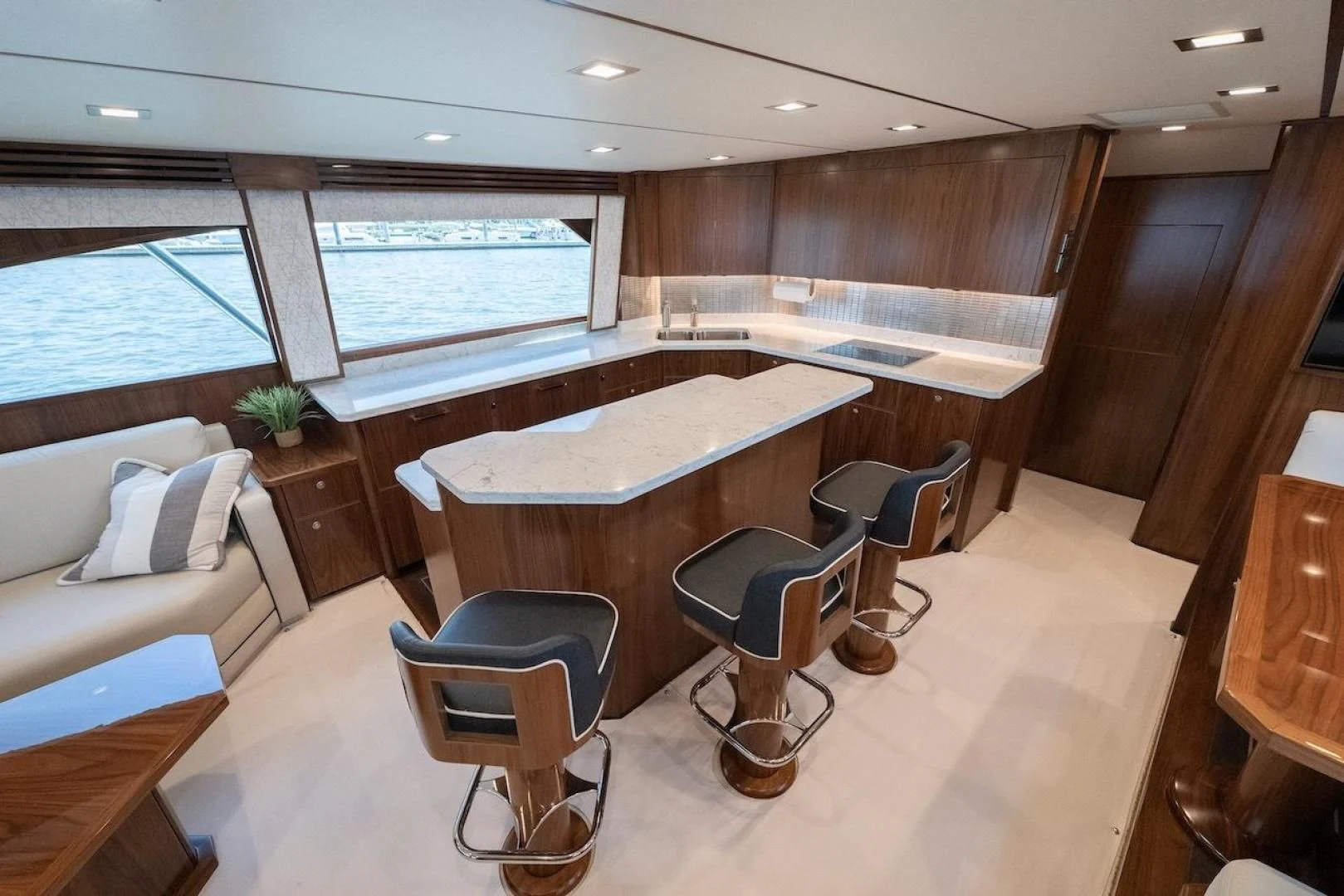 a room with a table and chairs aboard GAME ON Yacht for Sale