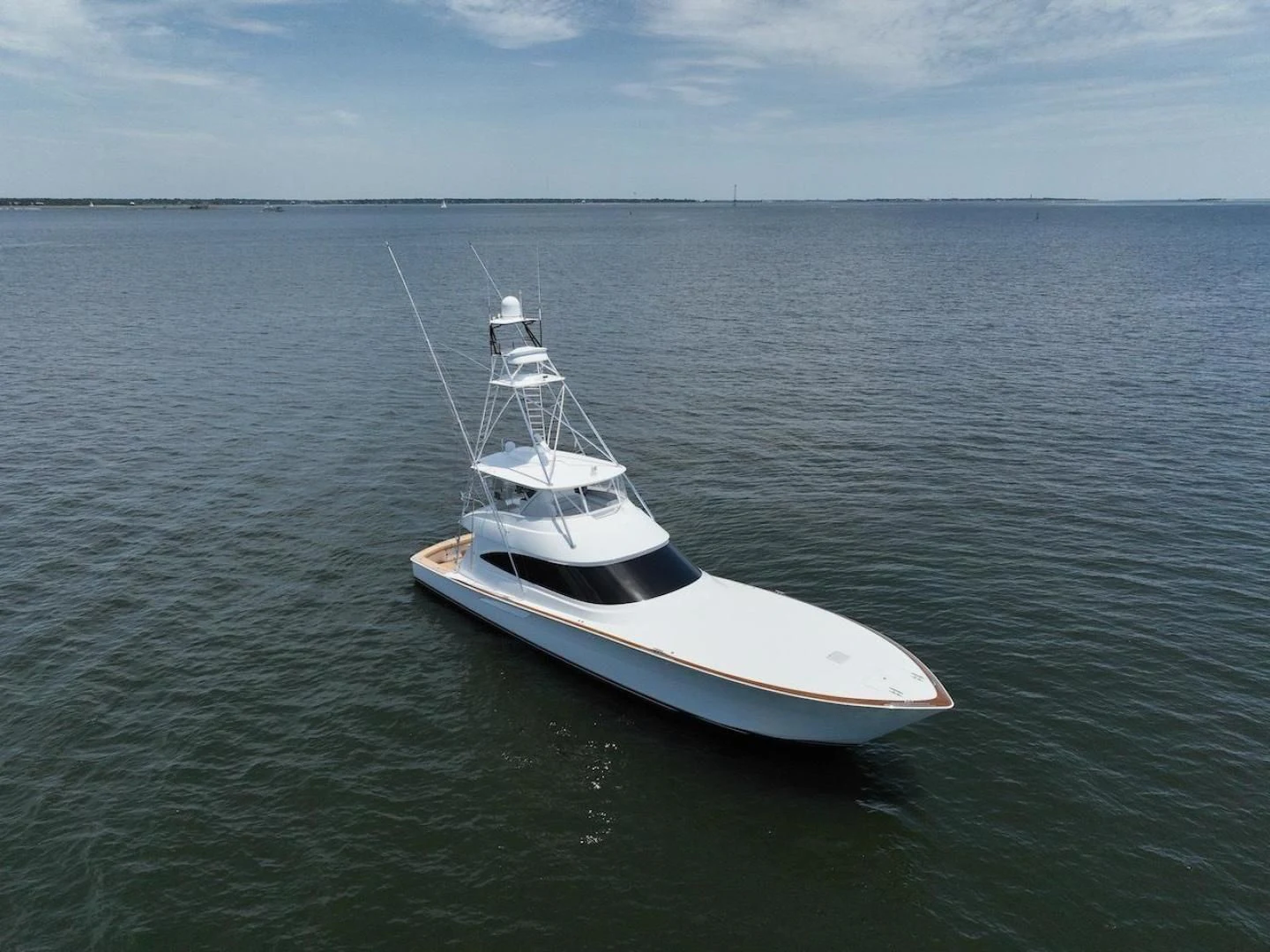 a small boat in the water aboard GAME ON Yacht for Sale