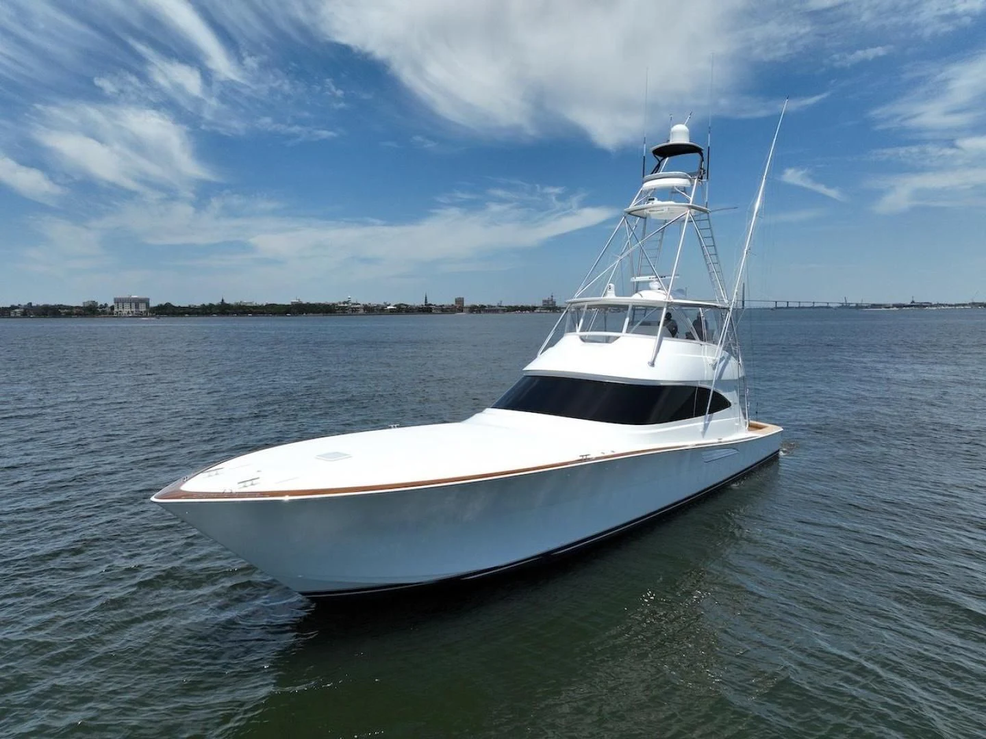 a white boat in the water aboard GAME ON Yacht for Sale